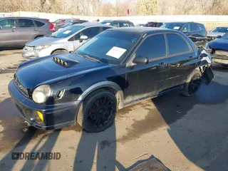 2003 Subaru Impreza WRX с VIN JF1GD29603H507417, выставлен на аукционе IAAI как лот 41349184 с пробегом 157 056 миль миль и . История ставок и продаж доступна на DreamBid. Изображение 17.
