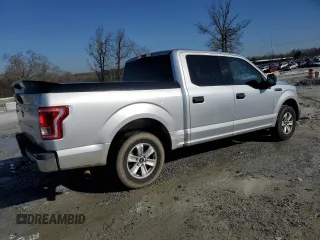 2015 Ford F-150 XLT with VIN 1FTEW1C88FKD74865, listed as a Copart auction lot 48251125 with 215,845 mi miles and Salvage Title. Bid and sale history available at carsss.com. Image 3.