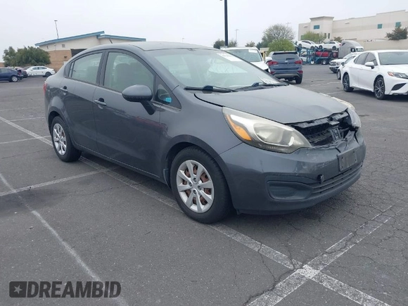 2013 Kia Rio SX with VIN KNADN4A33D6294075, listed as a IAAI auction lot 41728082 with 119,297 mi miles. Bid and sale history available at carsss.com. Image 1.