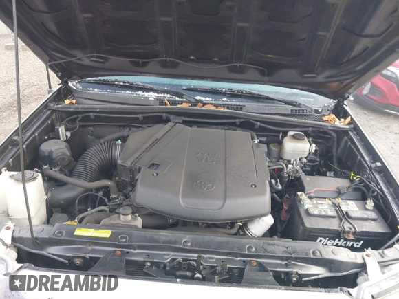 2015 Toyota Tacoma with VIN 3TMLU4EN7FM201302, listed as a IAAI auction lot 41666606 with 200,504 mi miles and . Bid and sale history available at DreamBid. Image 10.