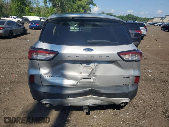 2020 Ford Escape Titanium Hybrid with VIN 1FMCU9DZ0LUC19127, listed as a Copart auction lot 64840315 with Not provided miles and Salvage title. Bid and sale history available at DreamBid. Image 6.