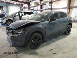 2024 Mazda CX-30 S Carbon Edition z VIN 3MVDMBCM3RM650546, wystawiony jako Copart lot #56434415 z przebiegiem 35 574 mil mil oraz Tytuł czysty. Historia ofert i sprzedaży dostępna na DreamBid. Obrazek 1.