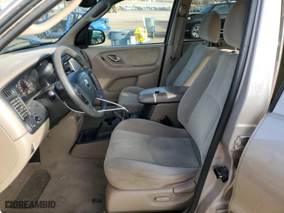 2002 Mazda Tribute LX with VIN 4F2YU08162KM59948, listed as a Copart auction lot 84931714 with 210,808 mi miles and Salvage Title. Bid and sale history available at carsss.com. Image 7.