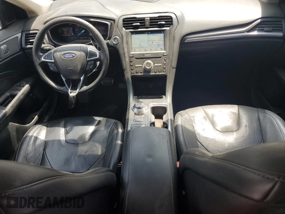 2017 Ford Fusion Titanium z VIN 3FA6P0SU8HR313773, wystawiony jako Copart lot #58791695 z przebiegiem 141 777 mil mil oraz Czysty tytuł • Clean title. Historia ofert i sprzedaży dostępna na DreamBid. Obrazek 8.