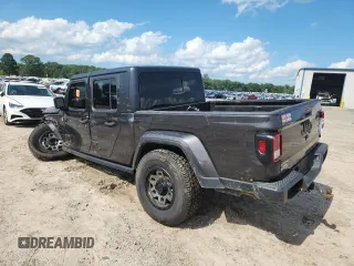 2021 Jeep Gladiator 80th Anniversary с VIN 1C6HJTAG7ML521094, выставлен на аукционе Copart как лот 61276595 с пробегом 68 684 миль миль и Списание • Salvage title. История ставок и продаж доступна на DreamBid. Изображение 2.