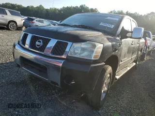 2006 Nissan Titan SE z VIN 1N6AA07B96N500661, wystawiony jako Copart lot #69952343 z przebiegiem 157 670 mil mil oraz Szkoda całkowita • Salvage title. Historia ofert i sprzedaży dostępna na DreamBid. Obrazek 1.