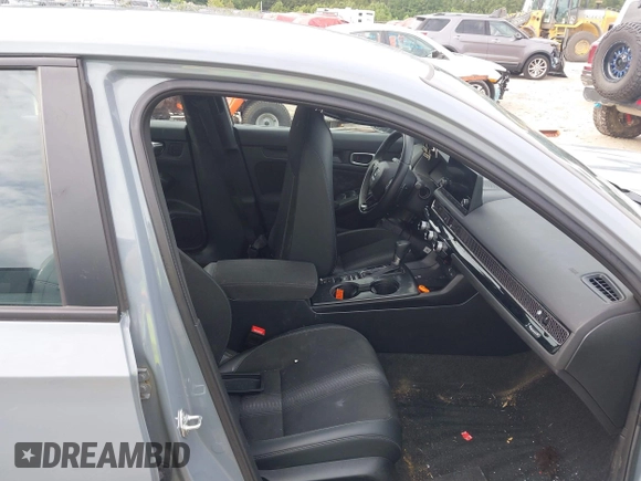 2023 Honda Civic Sport with VIN 2HGFE2F5XPH546709, listed as a IAAI auction lot 42453213 with 46,768 mi miles and . Bid and sale history available at DreamBid. Image 5.