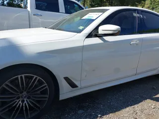 2019 BMW 5 Series 540i xDrive with VIN WBAJE7C52KWW14938, listed as a IAAI auction lot 40177765 with 57,722 mi miles and . Bid and sale history available at carsss.com. Image 6.