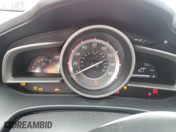 2014 Mazda 3 i Grand Touring z VIN JM1BM1M7XE1101669, wystawiony jako Copart lot #56504335 z przebiegiem 94 832 mil mil oraz Szkoda całkowita • Salvage title. Historia ofert i sprzedaży dostępna na DreamBid. Obrazek 9.