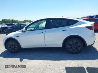 2025 Tesla Model Y Long Range with VIN 7SAYGDED6SF234278, listed as a IAAI auction lot 41781695 with 1,168 mi miles and . Bid and sale history available at DreamBid. Image 13.
