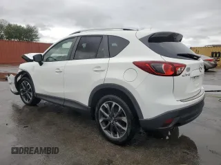 2016 Mazda CX-5 Grand Touring with VIN JM3KE2DYXG0839774, listed as a Copart auction lot 52336275 with 125,605 mi miles and Salvage Title. Bid and sale history available at carsss.com. Image 2.