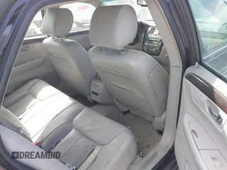 2011 Cadillac DTS Luxury Collection z VIN 1G6KD5E68BU125706, wystawiony jako IAAI lot #41832715 z przebiegiem 103 017 mil mil oraz . Historia ofert i sprzedaży dostępna na DreamBid. Obrazek 8.