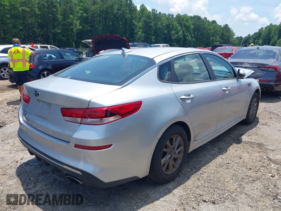 2019 Kia Optima LX with VIN 5XXGT4L3XKG345802, listed as a IAAI auction lot 42609317 with 74,664 mi miles and . Bid and sale history available at DreamBid. Image 4.