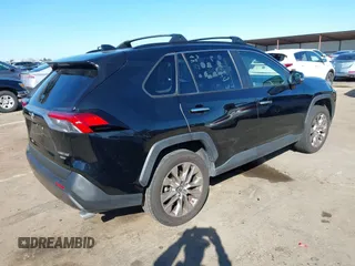 2019 Toyota RAV4 Limited with VIN JTMN1RFV5KD506624, listed as a IAAI auction lot 41657432 with 93,416 mi miles. Bid and sale history available at carsss.com. Image 4.