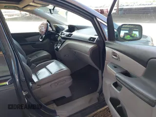 2012 Honda Odyssey EX-L with VIN 5FNRL5H6XCB103498, listed as a IAAI auction lot 42065658 with 104,933 mi miles and . Bid and sale history available at carsss.com. Image 5.
