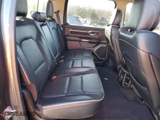 2021 Ram 1500 Laramie with VIN 1C6SRFJTXMN665384, listed as a Copart auction lot 42037685 with 76,836 mi miles and Salvage Title. Bid and sale history available at carsss.com. Image 10.