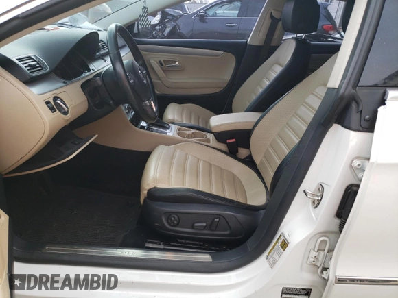 2013 Volkswagen CC R-Line with VIN WVWBP7AN4DE510996, listed as a Copart auction lot 77707134 with 123,748 mi miles and Clean Title. Bid and sale history available at carsss.com. Image 7.