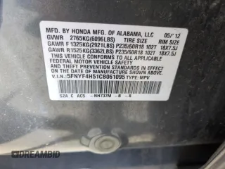 2012 Honda Pilot EX-L z VIN 5FNYF4H51CB061095, wystawiony jako Copart lot #57149985 z przebiegiem 170 486 mil mil oraz Szkoda całkowita • Salvage title. Historia ofert i sprzedaży dostępna na DreamBid. Obrazek 14.
