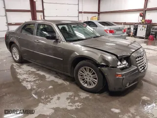 2008 Chrysler 300 Touring with VIN 2C3KA53G18H180306, listed as a IAAI auction lot 41514398 with 204,535 mi miles. Bid and sale history available at carsss.com. Image 1.