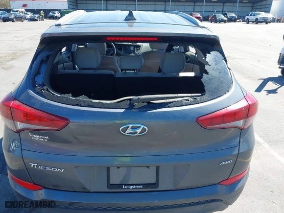 2018 Hyundai Tucson SEL with VIN KM8J3CA48JU718402, listed as a IAAI auction lot 41810363 with 218,853 mi miles. Bid and sale history available at carsss.com. Image 18.