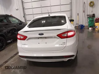 2015 Ford Fusion SE Hybrid with VIN 3FA6P0LU8FR215788, listed as a IAAI auction lot 42038194 with 136,949 mi miles and . Bid and sale history available at DreamBid. Image 16.