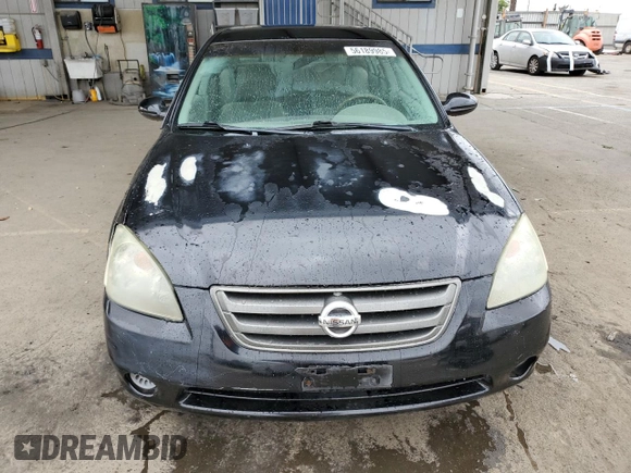 2004 Nissan Altima with VIN 1N4AL11D54C193517, listed as a Copart auction lot 56189985 with 210,451 mi miles and Salvage title. Bid and sale history available at DreamBid. Image 5.