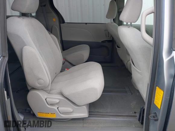 2012 Toyota Sienna LE AAS with VIN 5TDKK3DC1CS193107, listed as a IAAI auction lot 42068706 with 106,930 mi miles and . Bid and sale history available at DreamBid. Image 8.