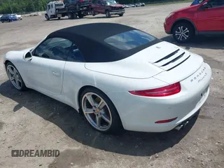 2014 Porsche 911 Carrera S z VIN WP0CB2A97ES154099, wystawiony jako IAAI lot #42264557 z przebiegiem 89 991 mil mil oraz . Historia ofert i sprzedaży dostępna na DreamBid. Obrazek 3.