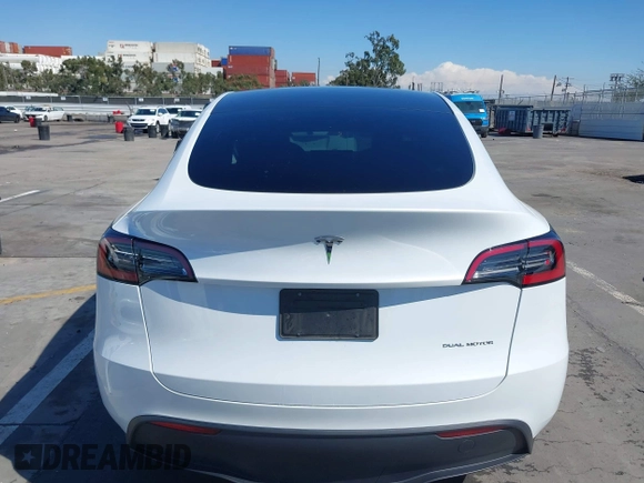 2023 Tesla Model Y Long Range with VIN 7SAYGDEEXPA129790, listed as a IAAI auction lot 41735721 with 20,402 mi miles and . Bid and sale history available at DreamBid. Image 17.