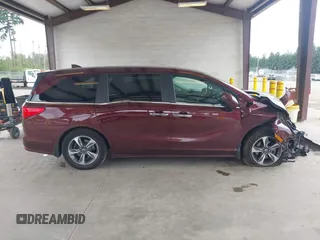 2019 Honda Odyssey Touring z VIN 5FNRL6H88KB030847, wystawiony jako IAAI lot #42433312 z przebiegiem Nie podano mil oraz . Historia ofert i sprzedaży dostępna na DreamBid. Obrazek 12.