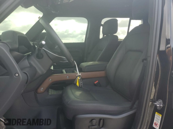 2024 Land Rover Defender X with VIN SALEXEEU0R2261987, listed as a Copart auction lot 46060625 with 5,062 mi miles and Salvage title. Bid and sale history available at DreamBid. Image 7.