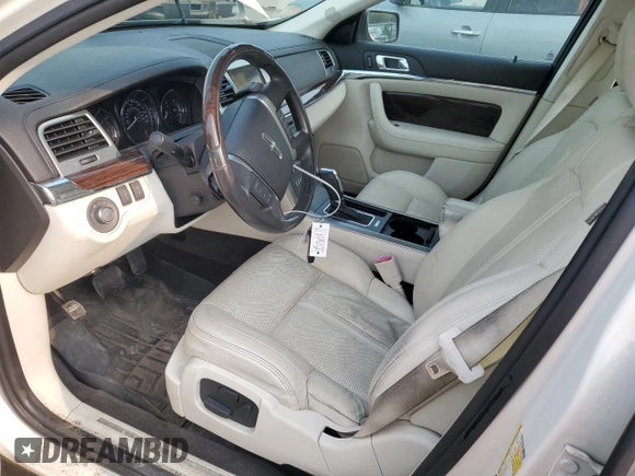 2012 Lincoln MKS z VIN 1LNHL9ER0CG803078, wystawiony jako Copart lot #60514765 z przebiegiem 82 715 mil mil oraz Szkoda całkowita • Salvage title. Historia ofert i sprzedaży dostępna na DreamBid. Obrazek 7.