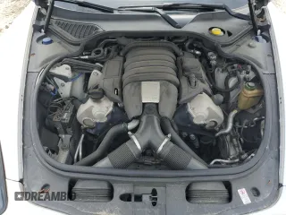 2014 Porsche Panamera z VIN WP0AA2A76EL010143, wystawiony jako Copart lot #54750715 z przebiegiem 132 333 mil mil oraz Szkoda całkowita • Salvage title. Historia ofert i sprzedaży dostępna na DreamBid. Obrazek 11.