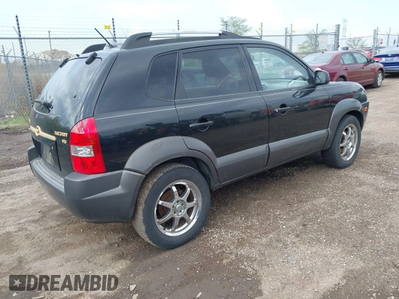 2005 Hyundai Tucson GLS with VIN KM8JN12D55U053476, listed as a IAAI auction lot 42118213 with 202,475 mi miles. Bid and sale history available at carsss.com. Image 4.