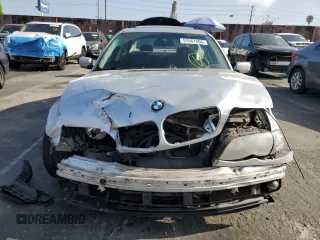 2002 BMW 3 Series 325i with VIN WBAEV33472KL73547, listed as a Copart auction lot 57667895 with 350,318 mi miles and Salvage title. Bid and sale history available at DreamBid. Image 5.