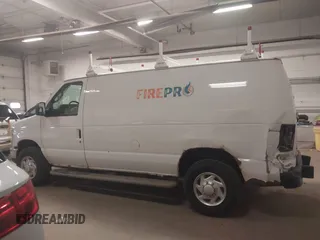 2012 Ford Econoline Cargo Recreational with VIN 1FTNE2EW4CDB03757, listed as a IAAI auction lot 42072612 with 147,153 mi miles. Bid and sale history available at carsss.com. Image 14.
