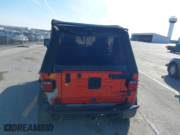 2005 Jeep Wrangler Sport with VIN 1J4FA49S85P344204, listed as a IAAI auction lot 41769319 with 105,927 mi miles. Bid and sale history available at carsss.com. Image 17.
