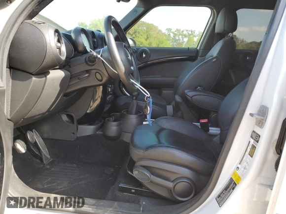 2014 MINI Countryman S with VIN WMWZC3C53EWP52333, listed as a Copart auction lot 54418495 with 34,687 mi miles and Salvage Title. Bid and sale history available at DreamBid. Image 7.