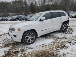 2021 Jeep Grand Cherokee Overland with VIN 1C4RJFCG1MC670340, listed as a Copart auction lot 88027485 with 59,472 mi miles and Salvage Title. Bid and sale history available at carsss.com. Image 1.