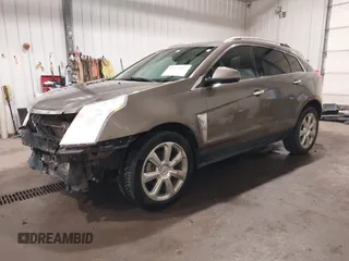 2014 Cadillac SRX Performance Collection z VIN 3GYFNFE38ES578066, wystawiony jako IAAI lot #42153023 z przebiegiem 134 009 mil mil oraz . Historia ofert i sprzedaży dostępna na DreamBid. Obrazek 18.