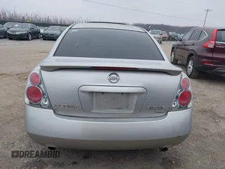 2005 Nissan Altima SE with VIN 1N4BL11E65C133566, listed as a IAAI auction lot 41792300 with 169,733 mi miles. Bid and sale history available at carsss.com. Image 16.