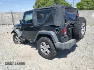 2012 Jeep Wrangler Sport z VIN 1C4AJWAG9CL257841, wystawiony jako Copart lot #57731255 z przebiegiem 112 614 mil mil oraz Szkoda całkowita • Salvage title. Historia ofert i sprzedaży dostępna na DreamBid. Obrazek 2.