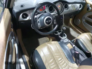 2002 MINI Hardtop with VIN WMWRC33402TC36986, listed as a Copart auction lot 50131045 with 194,224 mi miles and Salvage Title. Bid and sale history available at DreamBid. Image 8.