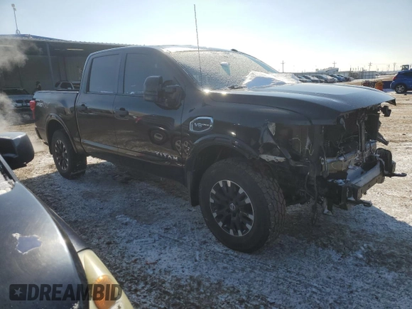 2017 Nissan Titan SV with VIN 1N6AA1E58HN554233, listed as a Copart auction lot 45388595 with 83,813 mi miles and Salvage Title. Bid and sale history available at DreamBid. Image 4.