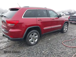 2013 Jeep Grand Cherokee Laredo with VIN 1C4RJEAG0DC516926, listed as a IAAI auction lot 41800254 with 259,006 mi miles. Bid and sale history available at carsss.com. Image 4.