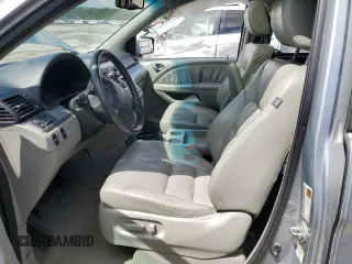 2010 Honda Odyssey EX-L с VIN 5FNRL3H79AB073307, выставлен на аукционе Copart как лот 55642225 с пробегом Не указан миль и Списание • Salvage title. История ставок и продаж доступна на DreamBid. Изображение 7.