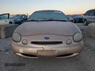 1997 Ford Taurus GL z VIN 1FALP52U9VG142664, wystawiony jako Copart lot #84054224 z przebiegiem 151 610 mil mil oraz Czysty tytuł • Clean title. Historia ofert i sprzedaży dostępna na DreamBid. Obrazek 5.
