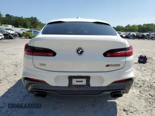 2019 BMW X4 M40i z VIN 5UXUJ5C57KLJ63215, wystawiony jako Copart lot #55150835 z przebiegiem Nie podano mil oraz Szkody całkowita. Historia ofert i sprzedaży dostępna na DreamBid. Obrazek 6.