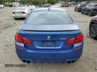 2014 BMW M5 z VIN WBSFV9C5XED097563, wystawiony jako Copart lot #72175354 z przebiegiem 73 406 mil mil oraz Szkody całkowita. Historia ofert i sprzedaży dostępna na DreamBid. Obrazek 6.