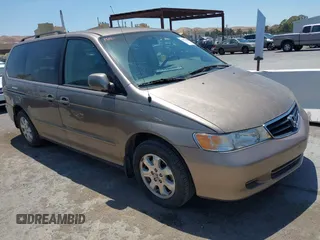 2003 Honda Odyssey EX-L z VIN 5FNRL18993B127164, wystawiony jako IAAI lot #42474080 z przebiegiem 152 838 mil mil oraz . Historia ofert i sprzedaży dostępna na DreamBid. Obrazek 1.